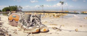 Flats Booties and Fly Tackle on Beach [photo: Davin Ebanks, Fish Bones Fly Fishing, Cayman]